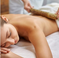 Massagem com Bambus
